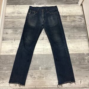 Levi’s dark blue jeans 514 distressed look size 33x34